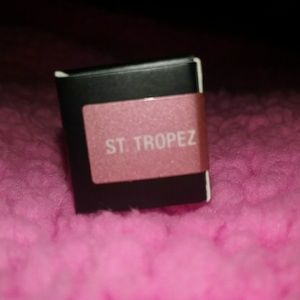 Lip gloss. Pink and gold sparkly color!